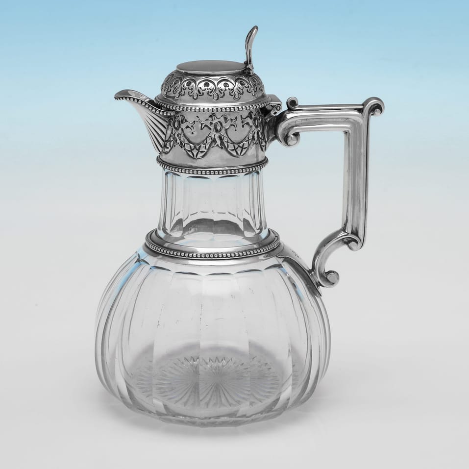 Discover Rare Antique Claret Jugs: Elegant Glass and Silver Pieces